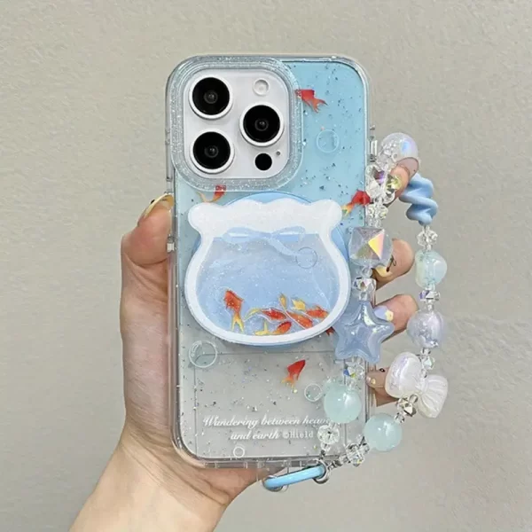 Handle protection case for iPhone 15 and 16, featuring a gradient navy blue design and a cute little goldfish. Comes with a magnetic stand for easy shaking.